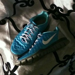 Women's NIKE "FREE TR FIT" US size 7 Metallic Blue